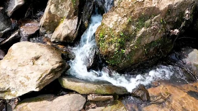 Aerial of multiple layer Waterfall in a forest during spring in central, SC