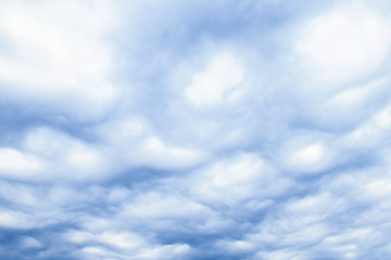 a Clouds fluffy in the sky storm on nature background. Danger before the rain.