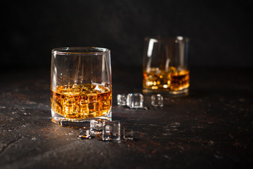 Glasses of whiskey with ice