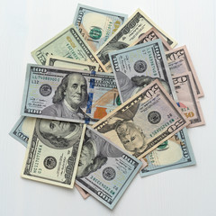 American dollar banknotes money on white background, financial concept