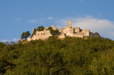 Plavecky hrad. (Plavecky castle). Ruins of ancient castle above the Plavecké Podhradie village. Rubble of old castel, important attraction of the western slopes of the Malé Karpaty Mts. Záhorie region