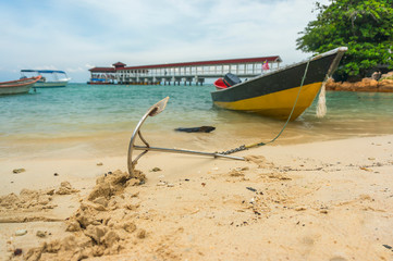 Anchored boat at seashore of Perhentian Island, Malaysia