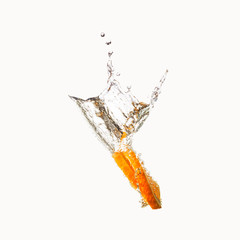 bright orange falls into the water 