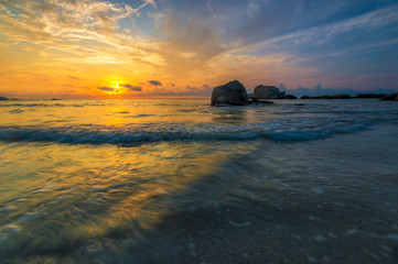 Fototapeta na wymiar Beach with sunrise background