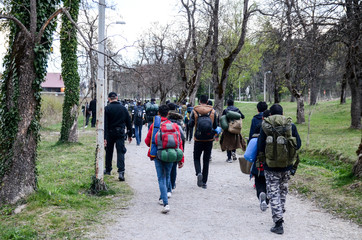 Police and migrants walking in Bihac, BiH. Bosnia and Herzegovina struggles with thousands of...