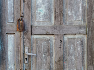 Old long closed wooden door.