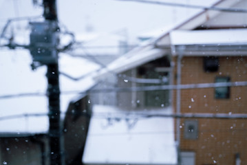 Snow falling on residential area / Tokyo, Japan