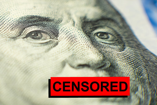 portrait of Benjamin Franklin from a hundred-dollar bill with a closed mouth and the caption title CENSORED. paid censorship concept. corrupt practices. silence for money.