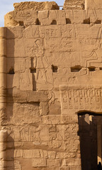 Luxor Governorate, Egypt, Karnak Temple, complex of Amun-Re. Embossed hieroglyphics on columns and...