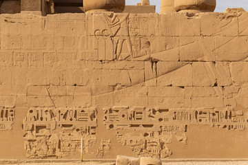 Luxor Governorate, Egypt, Karnak Temple, complex of Amun-Re. Embossed hieroglyphics on columns and...