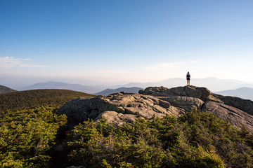 person on the top of mountain
