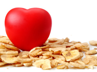 Dried banana and red heart, concept healthy food for heart.