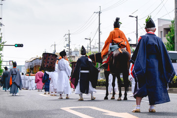 People with traditional costumes of Heian period at Aoi Matsuri parade, Kyoto, Japan