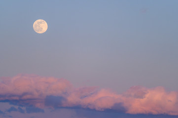 moon over the clouds sunset
