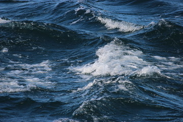 Sea waves crashing water