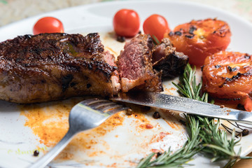 Delicious fresh steak. Juicy piece of meat. Roasted meat. The meat and vegetables.