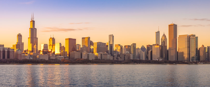 Chicago downtown skyline sunset Lake Michigan with most Iconic building from Adler Planetarium, Illinois