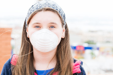 Girl in protective mask