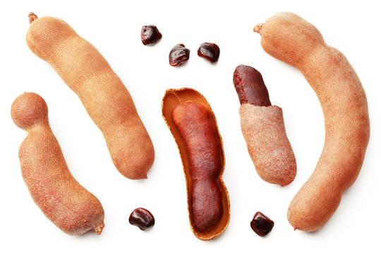 fresh tamarind fruits isolated on white background. top view