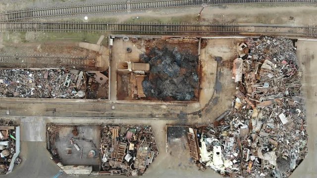 orting and recycling of metal waste top view. Scrap metal procurement station. Loading operations for the utilization of ferrous metals 4k.