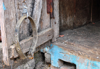  old dog collar on an empty doghouse