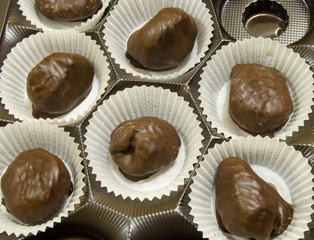 Chocolate candies figs in a box