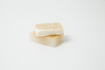 Homemade homemade oatmeal and honey soaps on white background - skin care - natural beauty