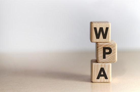 WPA - Wi-Fi Protected Access - Non Disclosure Agreement - Text On Wooden Cubes, On White Background