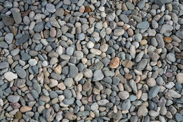 pebbles, small stones from the surface of gray