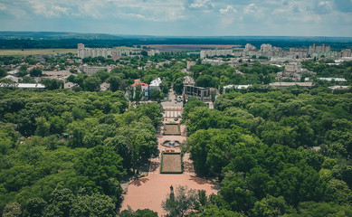 Fototapeta na wymiar Aerial panorama of Tiraspol, viewed from the Pobeda park, with the long park avenue clearly seen leading into the city, capital of Transnistria.