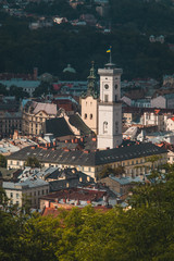 Panorama of Lviv city, looking towards Town hall viewed from observation point on castle hill on a sunny day.