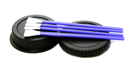 A cleaning swab for matrix frame cameras isolated. A sweeper for sensor cleaning. Digital camera service. Swabs for digital camera isolated.