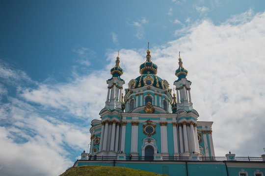 Beautiful orthodox church of St. Andrew in Kiev, Ukraine, on a summer day with some clouds. View from below.