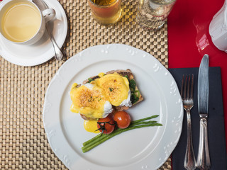 Eggs Benedict with vegetables 