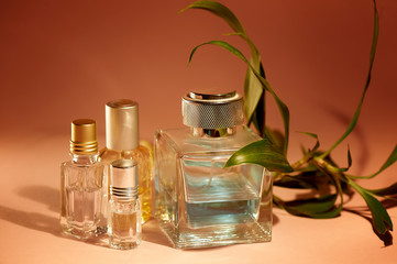 A large bottle of men's perfume and oil for the fragrance. Tropical smell. Aromatherapy, perfumes.