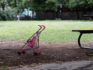 Abandoned stroller in a park