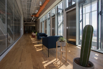 Clean, modern and pleasant corporate office corridors with panoramic views of the city