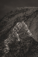 Windswept Frozen Snow Capped Mountain Summit Peaks in Winter