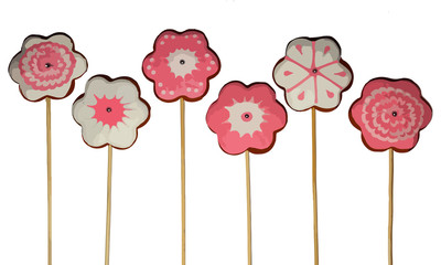Graphic image of toppers made of gingerbread flowers in the form of a white background