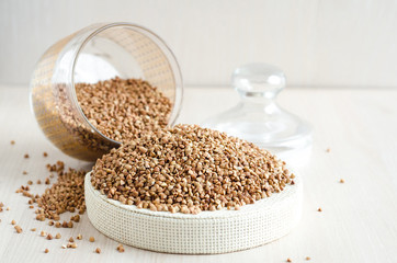 buckwheat stocks on light wooden background. vegetarian food
