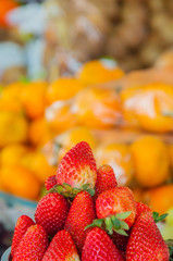 portion of strawberries stacked with an unfocused background