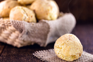 cheese bread made in minas gerais, with selective focus. Rustic background, concept of brazilian cuisine.