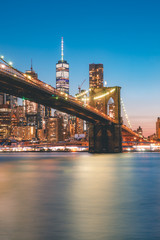 Obraz na płótnie Canvas Dusk photo of Brooklyn Bridge and New York skyline after sunset