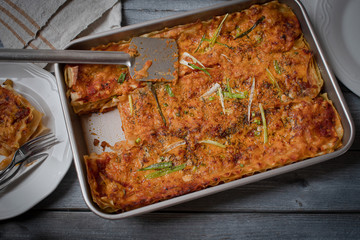 Vegetarian lasagne bolognese made with seitan baked in metal pan