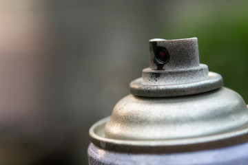 close up head aluminum spray paint can. with copy space