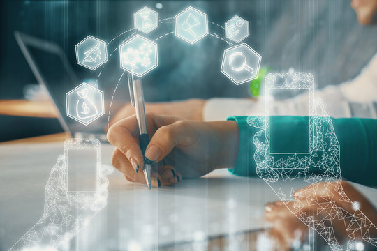 Double exposure of technology theme drawing over people taking notes background. Concept of Tech