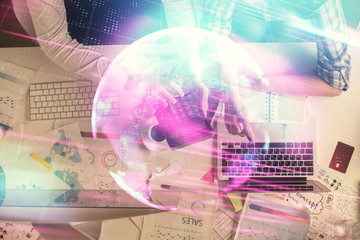 Double exposure of man and woman working together and technology theme drawing. Computer background. Top View. High tech concept.