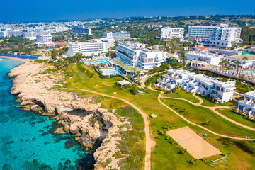Island of Cyprus. Panorama of Cyprus from a height. Hotels on the Mediterranean coast. Bridge of lovers. Beach Glyki Nero. Cape Greco. Coastline. Beach holiday. Visit To The Mediterranean Sea.