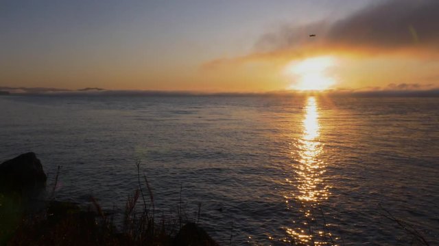 Columbia river gorge astoria orange sunrise sun star clouds timelapse 