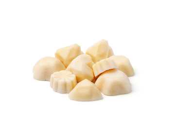 White chocolate in the form of a flower shape on a white background